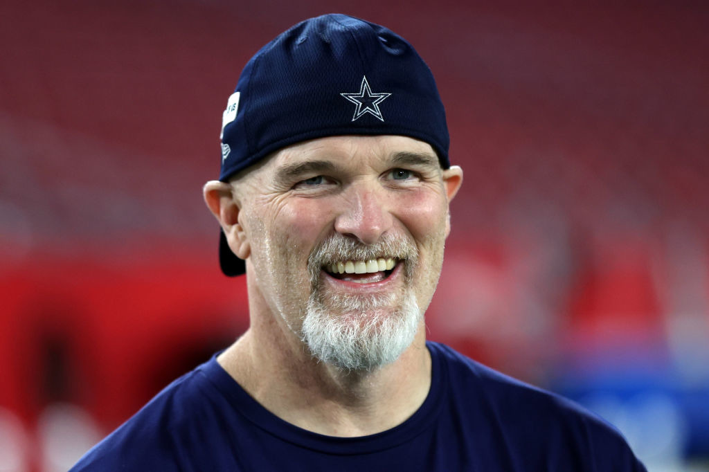 TAMPA, FLORIDA - JANUARY 16: Defensive coordinator Dan Quinn of the Dallas Cowboys stands on the field against the Tampa Bay Buccaneers prior to th...